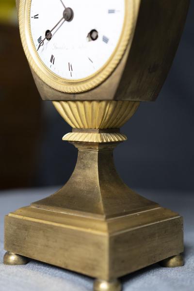 LOUIS XVI PERIOD GILT BRONZE RAMS HEAD CLOCK