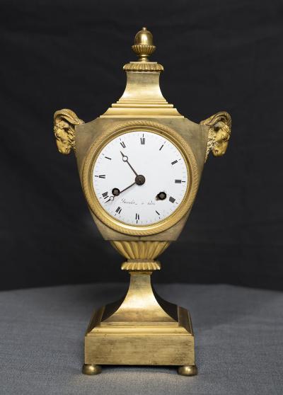 LOUIS XVI PERIOD GILT BRONZE RAMS HEAD CLOCK