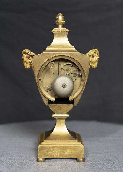 LOUIS XVI PERIOD GILT BRONZE RAMS HEAD CLOCK
