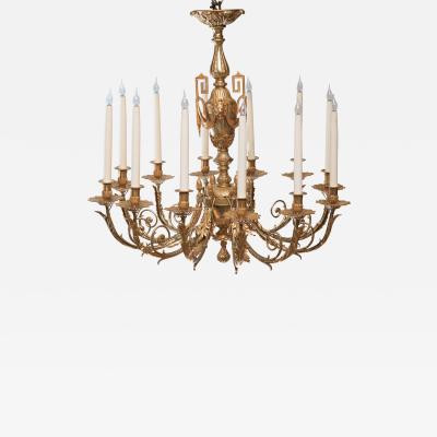 LOUIS XVI STYLE GILT BRONZE TWELVE LIGHT CHANDELIER