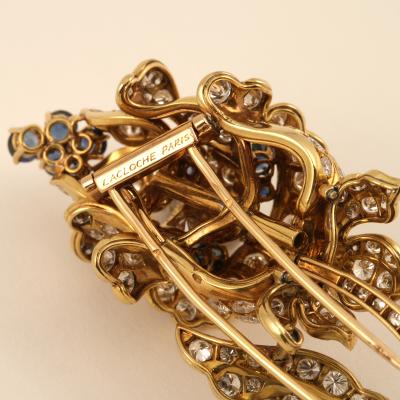 Lacloche Fr res LaCloche Paris Mid 20th Century Diamond Sapphire and Gold Flower Brooch