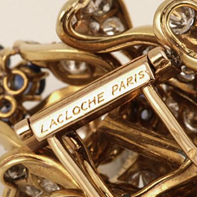 Lacloche Fr res LaCloche Paris Mid 20th Century Diamond Sapphire and Gold Flower Brooch