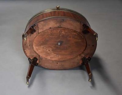 Large 18thc mahogany brass bound oval cellarette of fine patina