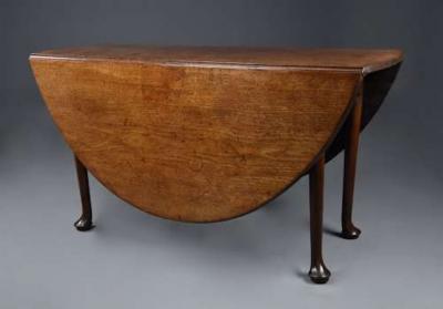 Large 18thc solid walnut drop leaf dining table of fine faded patina