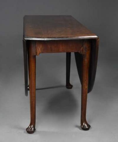 Large 18thc solid walnut drop leaf dining table of fine faded patina