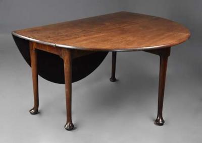 Large 18thc solid walnut drop leaf dining table of fine faded patina