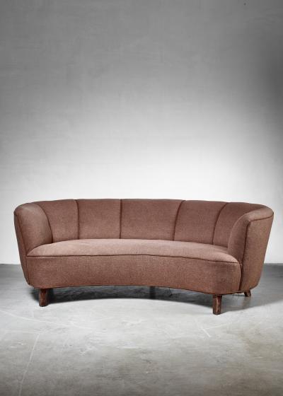 Large Danish curved sofa