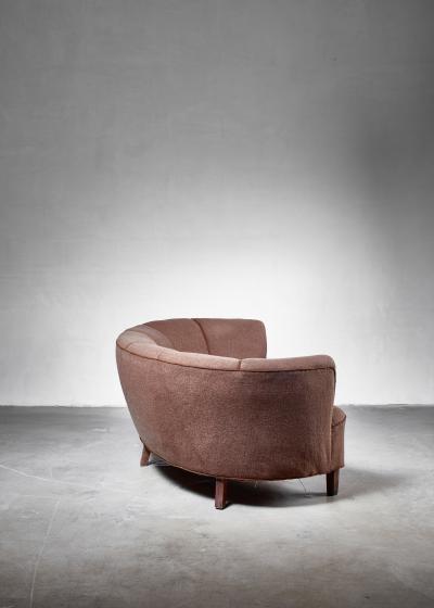 Large Danish curved sofa