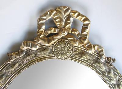 Large Dutch Neoclassical Style Silver and Gold Gilt Repouss Oval Mirror