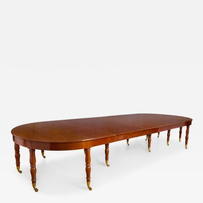 Large Empire period mahogany extending dining table