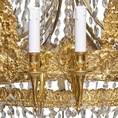 Large French Empire style glass and gilt bronze 18 light chandelier