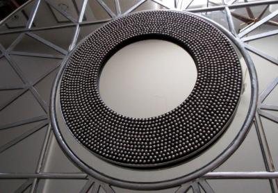 Large Geometric Form Wall Mirror with a Studded Center