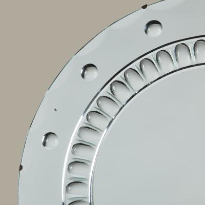 Large Italian Art Deco round mirror with highly decorative optic bullseye detail