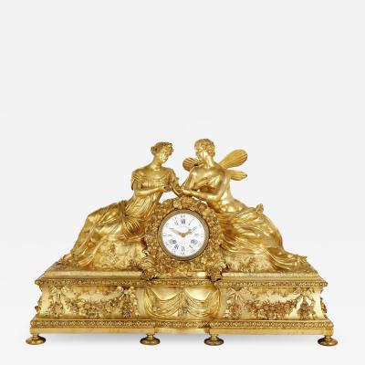 Large Neoclassical style gilt bronze mantel clock with Cupid and Psyche