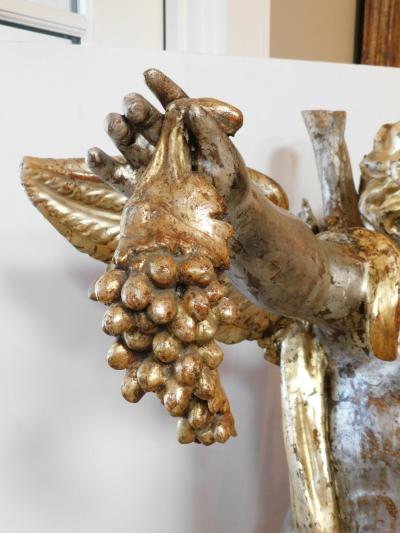 Large Pair of Roman Rococo Carved Giltwood Putti Harvesting Grapes