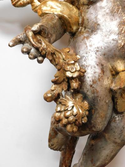 Large Pair of Roman Rococo Carved Giltwood Putti Harvesting Grapes