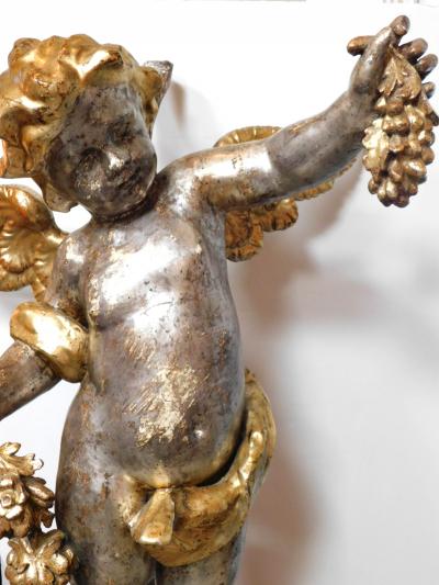 Large Pair of Roman Rococo Carved Giltwood Putti Harvesting Grapes