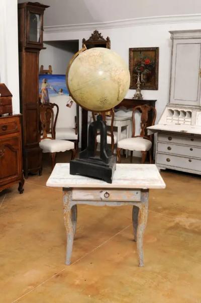 Large Swedish 1910s Freestanding Terrestrial Globe on Black Carved Base