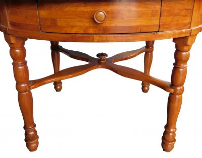 Large Swiss cherrywood single drawer circular center table
