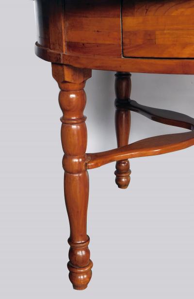 Large Swiss cherrywood single drawer circular center table