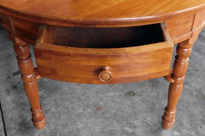 Large Swiss cherrywood single drawer circular center table