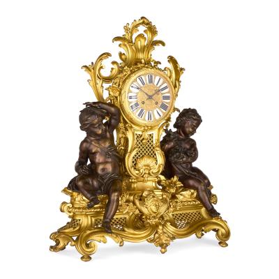 Large antique French Louis XV style patinated and gilt bronze clock set