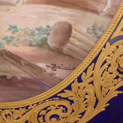 Large antique porcelain and ormolu vase painted with a genre scene