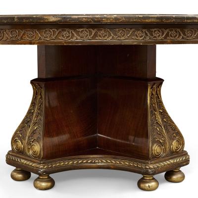 Large circular centre table adorned with gilt bronze and marquetry