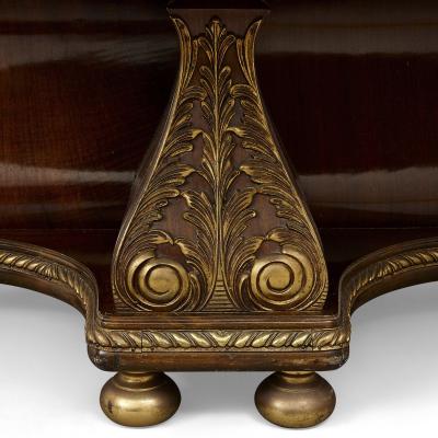 Large circular centre table adorned with gilt bronze and marquetry