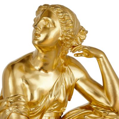 Large gilt bronze and malachite Charles X style mantel clock