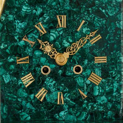 Large gilt bronze and malachite Charles X style mantel clock