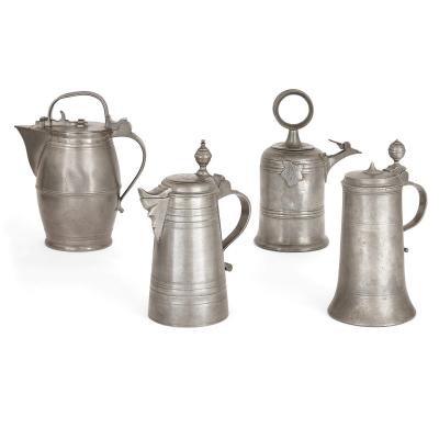 Large group of antique German pewter mugs tankards and ewers