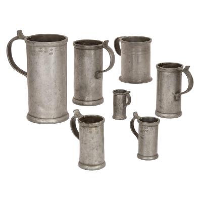 Large group of antique German pewter mugs tankards and ewers