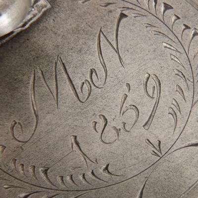 Large group of antique German pewter mugs tankards and ewers