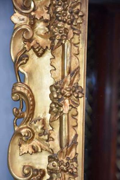 Large highly decorative mid 19th century Italian carved giltwood dressing mirror