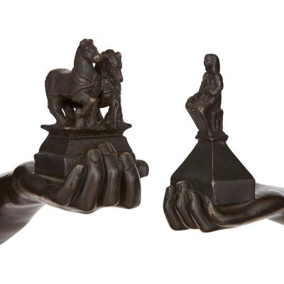 Large pair of Empire style patinated bronze sculptures