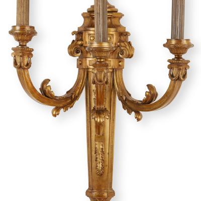 Large pair of Louis XVI style three branch ormolu wall lights