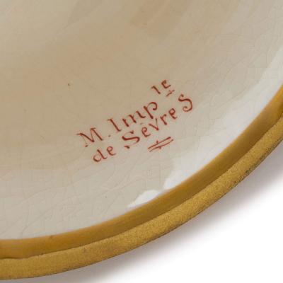 Large pair of S vres style porcelain Napoleonic vases with ormolu mounts