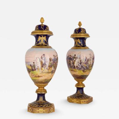 Large pair of S vres style porcelain Napoleonic vases with ormolu mounts