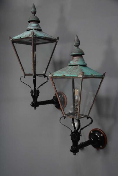 Large pair of Windsor style copper street lanterns supported on wall brackets