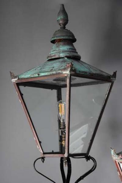 Large pair of Windsor style copper street lanterns supported on wall brackets