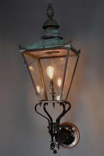 Large pair of Windsor style copper street lanterns supported on wall brackets