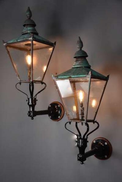 Large pair of Windsor style copper street lanterns supported on wall brackets