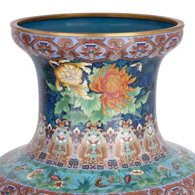 Large pair of floral Chinese cloisonn enamel vases on wooden plinths