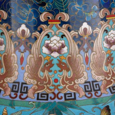 Large pair of floral Chinese cloisonn enamel vases on wooden plinths
