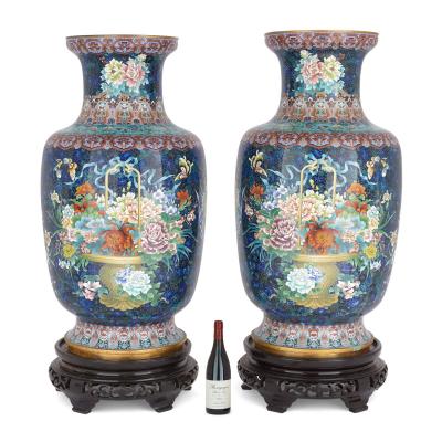 Large pair of floral Chinese cloisonn enamel vases on wooden plinths