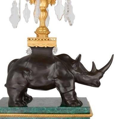 Large pair of ormolu and malachite rhino table candelabra