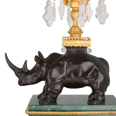 Large pair of ormolu and malachite rhino table candelabra