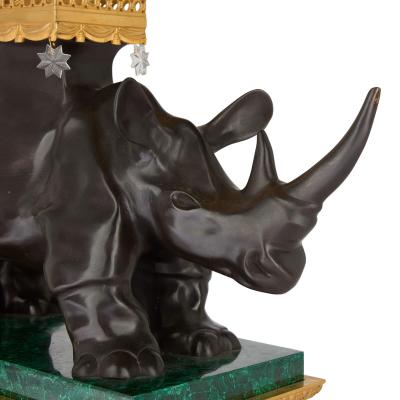 Large pair of ormolu and malachite rhino table candelabra