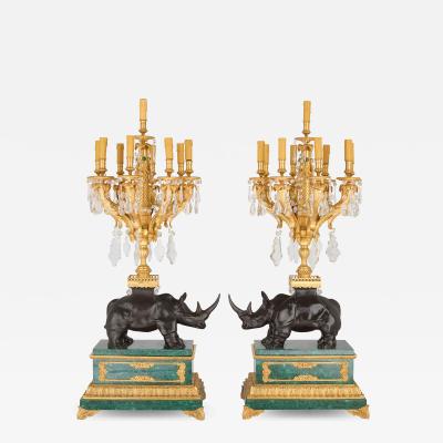 Large pair of ormolu and malachite rhino table candelabra